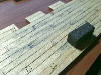 Lijado de cabezas con piedra.jpg