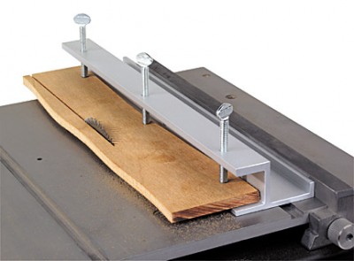 #84051 Straighten it. Recover unevenly cut wood or put a new edge on a part with our Straighten it table saw guide. Use the three thumb screws (included) to secure the workpiece to the extruded aluminium frame and run through your saw. The result is a per