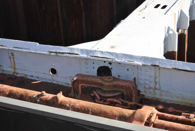 Detalle de la cadena que abre las puertas de la cantara. Las alas de las cantaras tapan la separación entre cantaras y no se ve la roldana que aparece en los planos