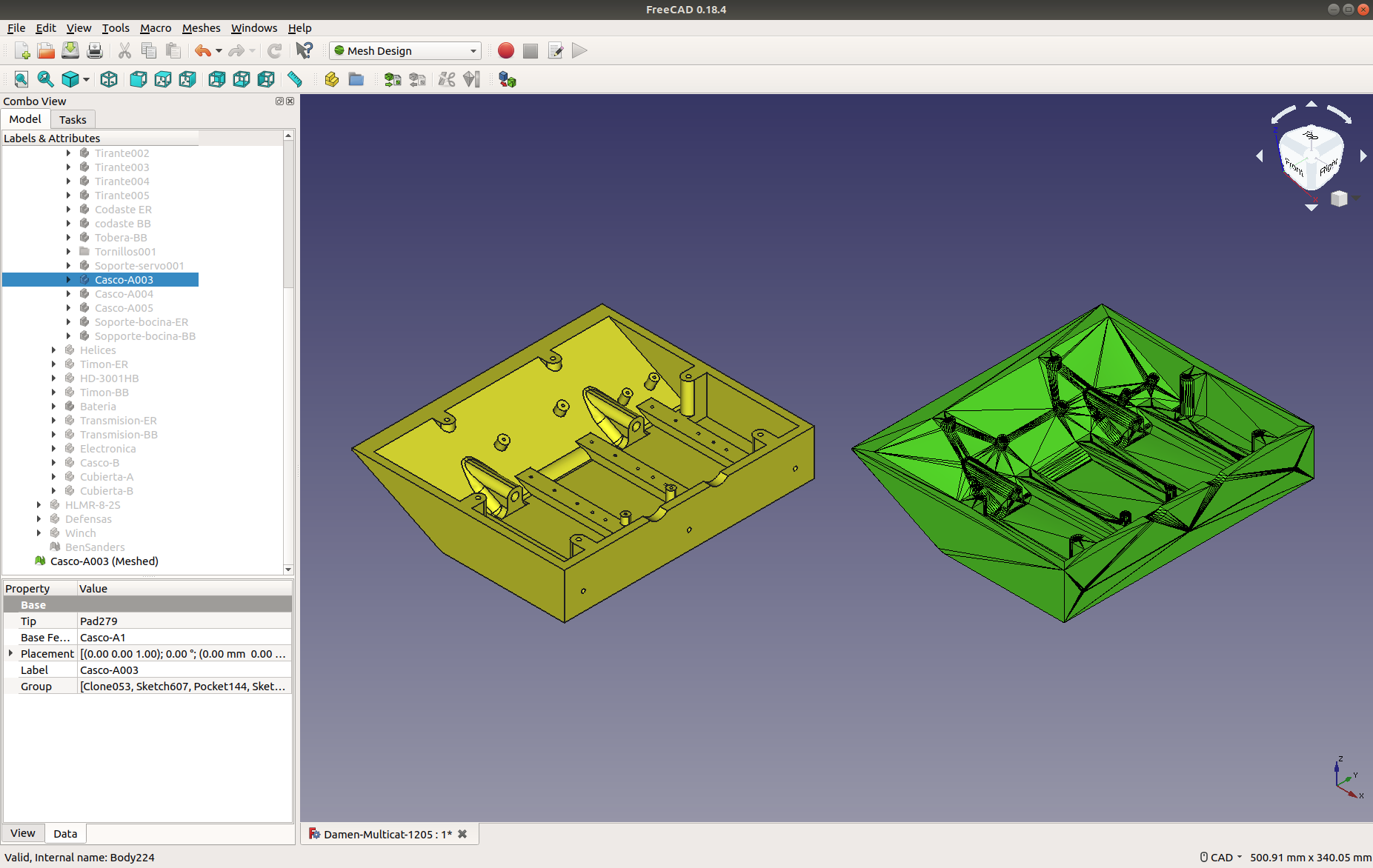 En la foto se puede ver la pieza de Freecad en amarillo y la malla creada a partir de ella en verde