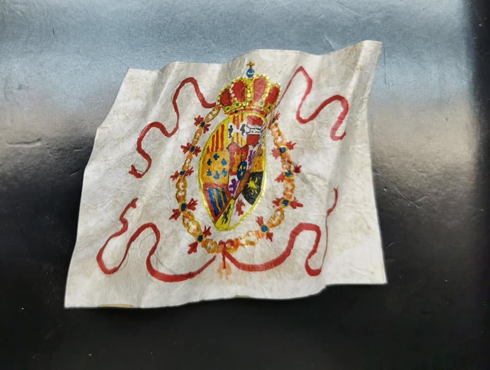 Creo que es por epoca la que debe de llevar, hacerla en papel de seda, o del de papiroflexia?