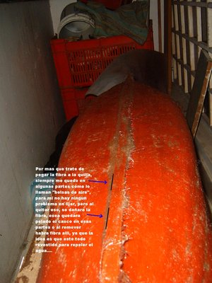 la misma foto (Nº480), si retiro las bolsas al lijar, quedara abajo resina o fibra o el casco pelado osea la madera... o mejor lo dejo asi???.