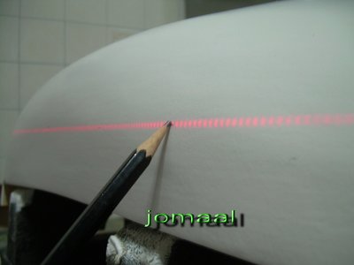 Marcando linea de flotación con un laser